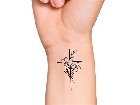 small cross with flowers tattoo|cross tattoos with flowers for women.